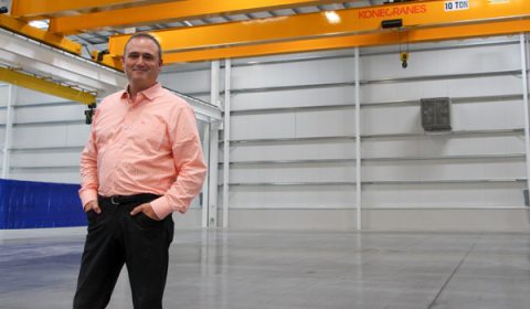 Matt Miller, Co-Owner of Miller Industries standing in his warehouse